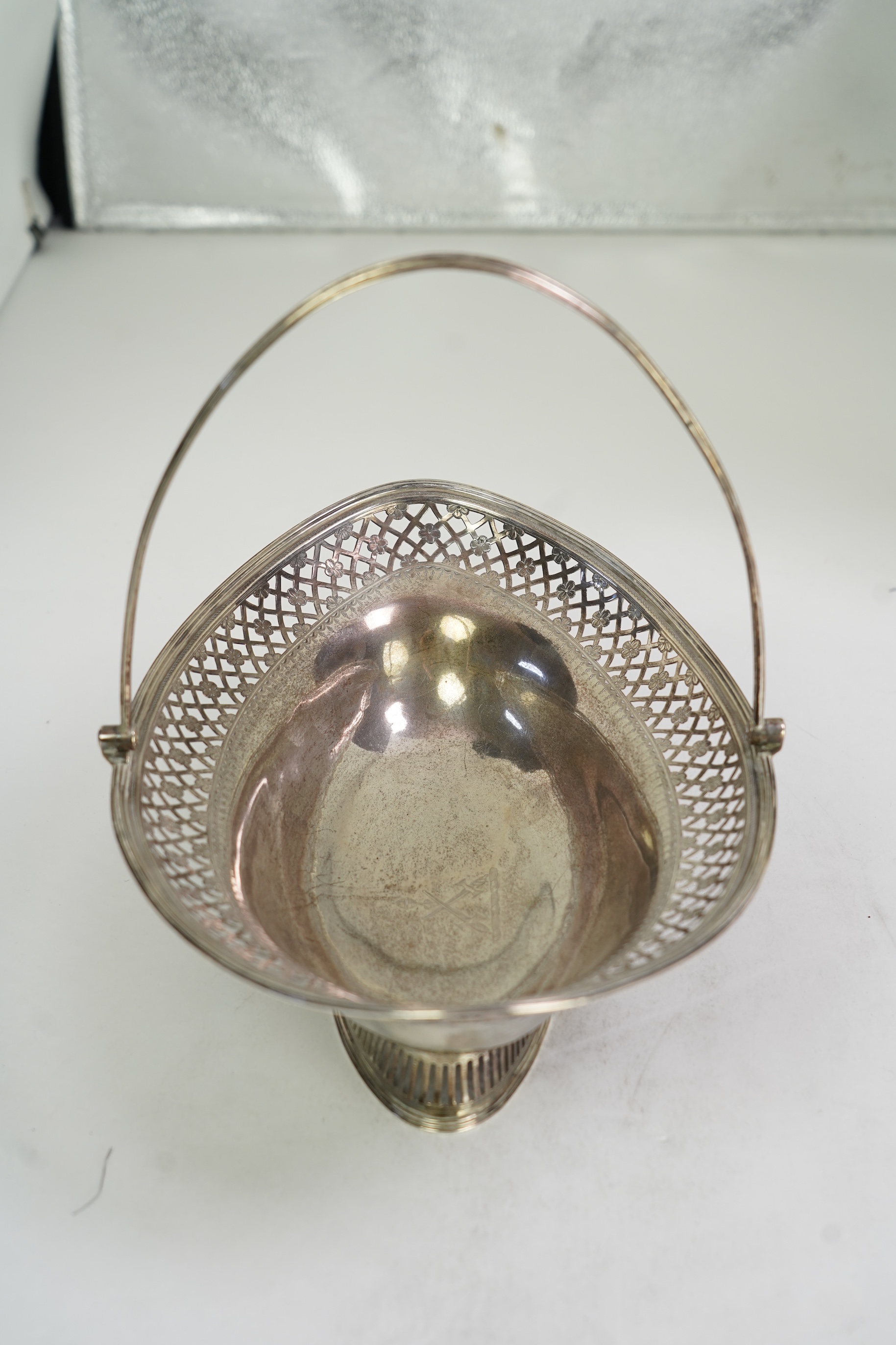 A George III silver oval cake basket, by William Allen III